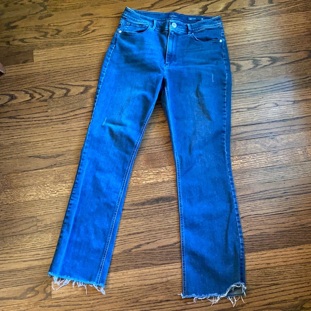 J Jill kick flare slightly distressed ankle jeans.